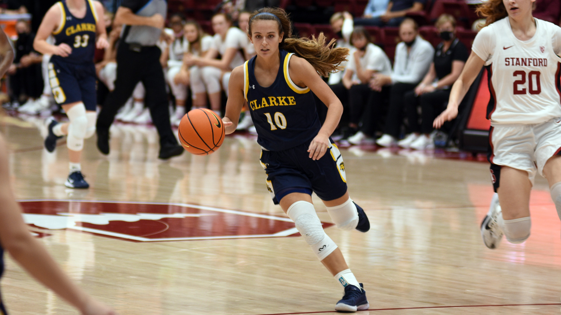 Giana Michels pushing the ball up the floor