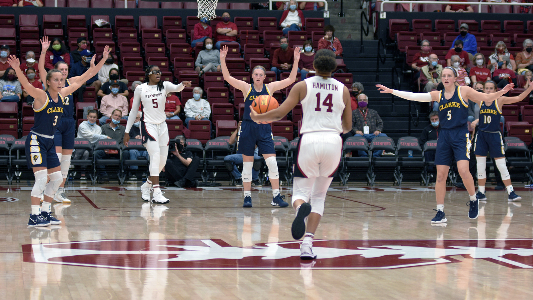 Clarke women's basketball players in their zone defense