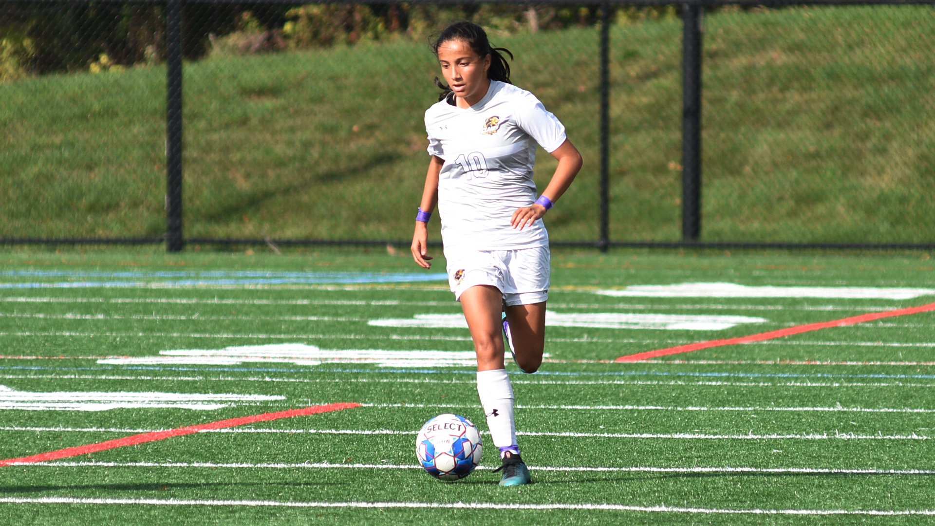 Clarke's Sofia Morales dribbling forward on the attack