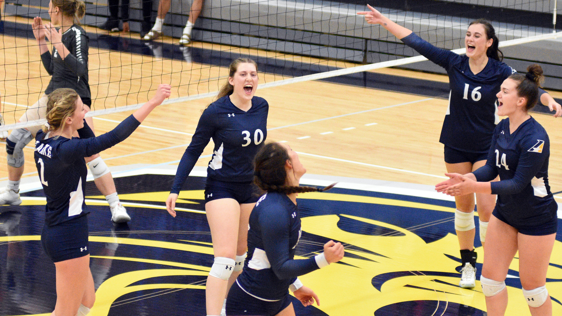 Pride women's volleyball celebrating their win over Culver Stockton